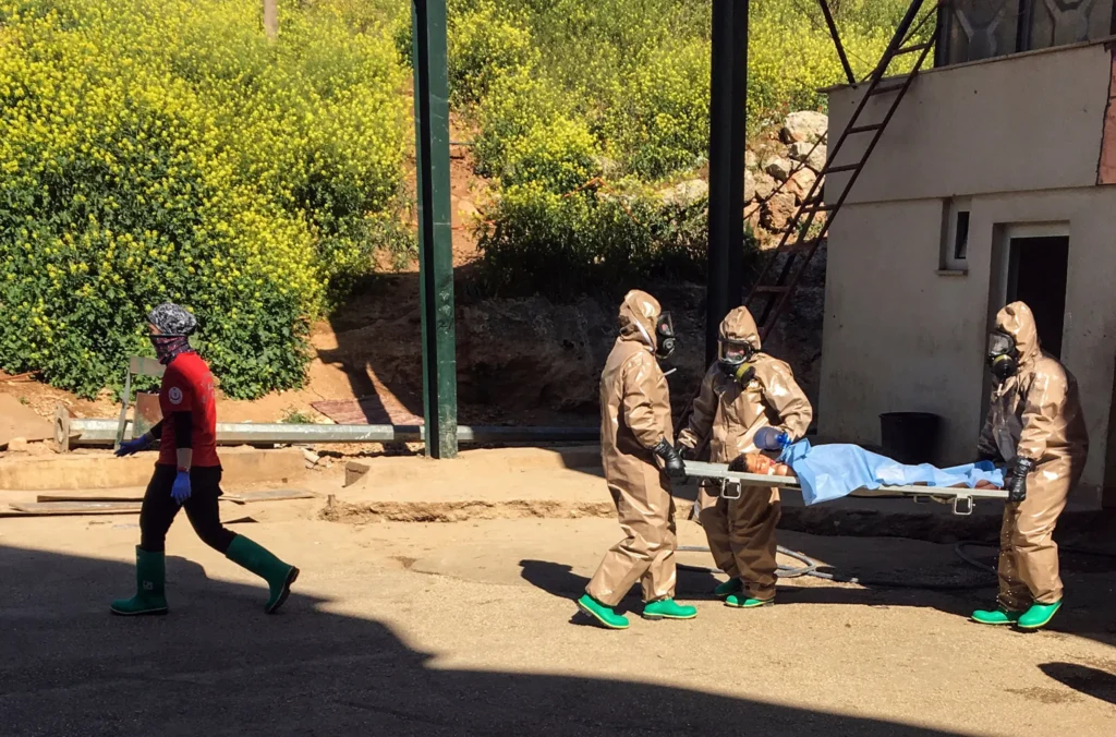 A victim of an attack in the Syrian province of Idlib at a hospital in Reyhanli, Turkey, on Tuesday. Justice Minister Bekir Bozdag of Turkey was quoted as saying that autopsies conducted on three Syrians brought to his country after the attack showed they had been subjected to a chemical agent.Credit...Associated Press